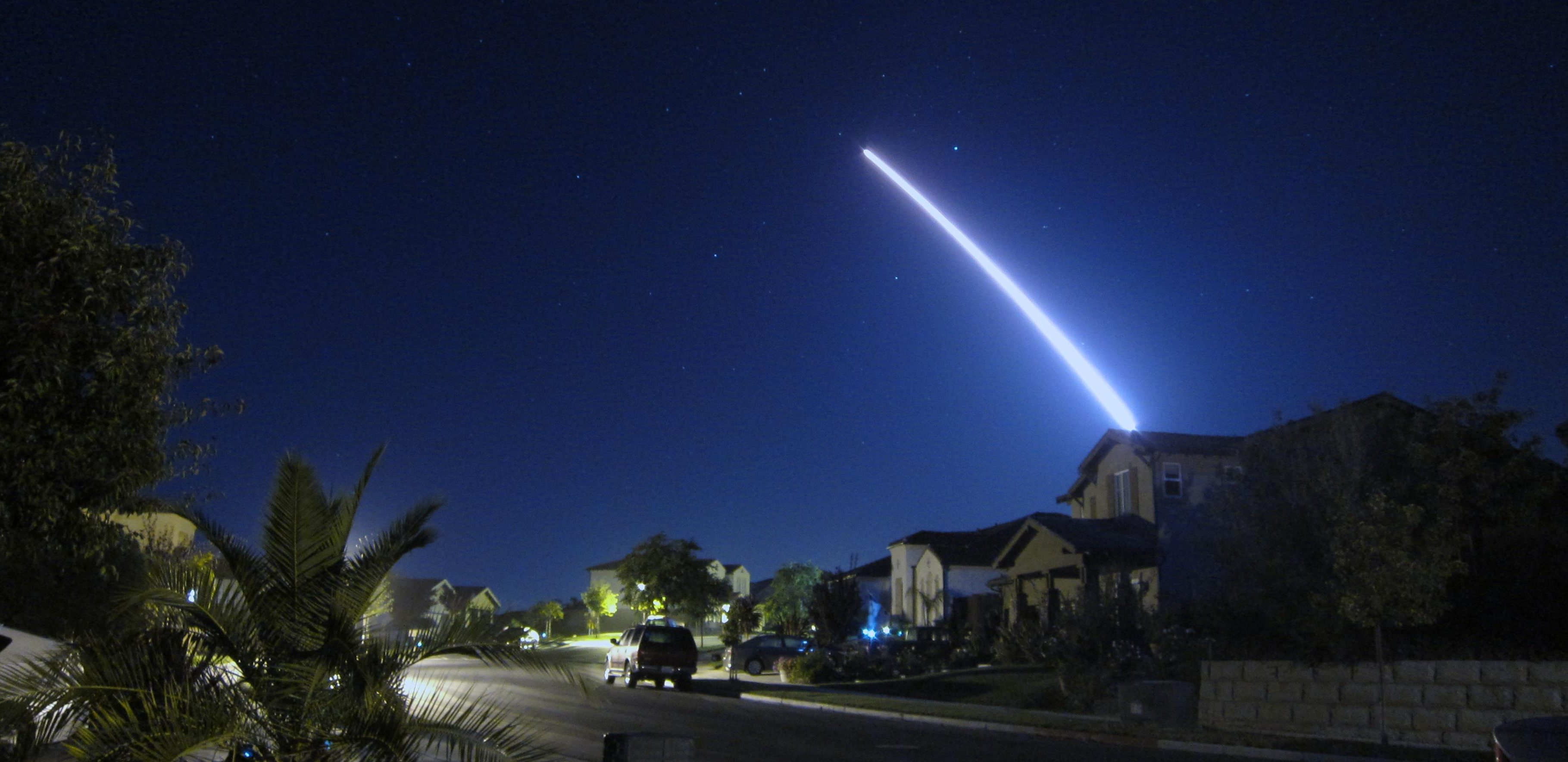 An operational test launch of an unarmed Minuteman III intercontinental ballistic missile from Vandenberg Air Force Base, Calif., is seen from nearby Lompoc, Calif., Sept. 26, 2013. The ICBM safely launched and traveled the approximately 4,200 nautical miles to its target in the Marshall Islands. Photo credit: Lt. Col. Andy Wulfestieg, U.S. Air Force.