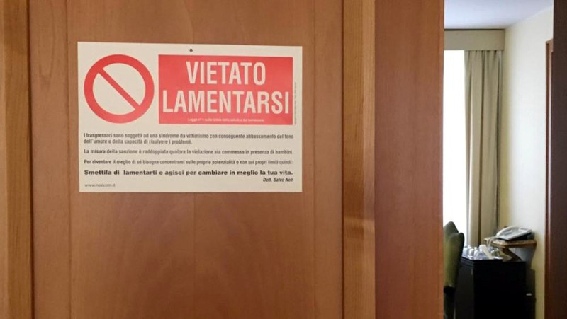 A placard reading, "No Whining" is seen on Pope Francis' room door in this undated picture posted on the Vatican Insider website.